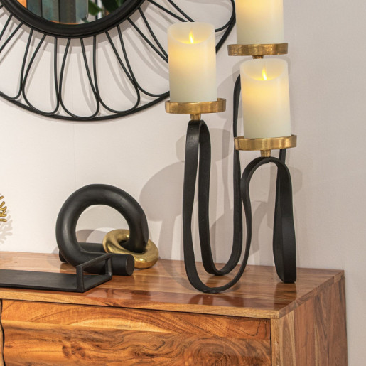 Candelabro negro y dorado