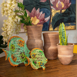 Figura portavelas verde y naranja