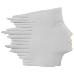 Figura rostro perfil crema y dorado