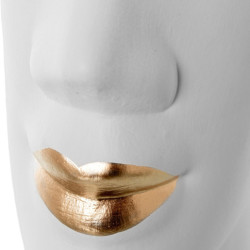 Figura rostro perfil crema y dorado