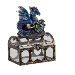Figura de un dragon sobre un baul Azul