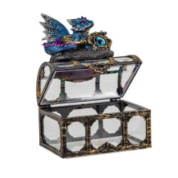 Figura de un dragon sobre un baul Azul