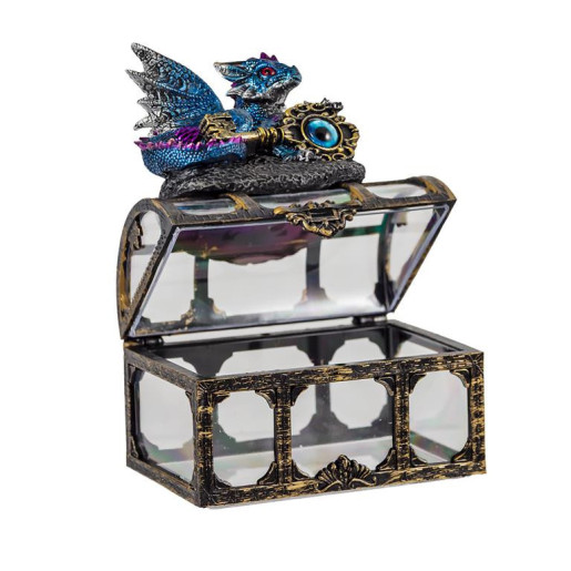 Figura de un dragon sobre un baul Azul