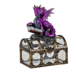 Figura de un dragon sobre un baul Morado