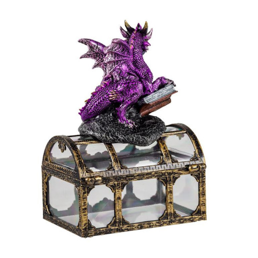 Figura de un dragon sobre un baul Morado