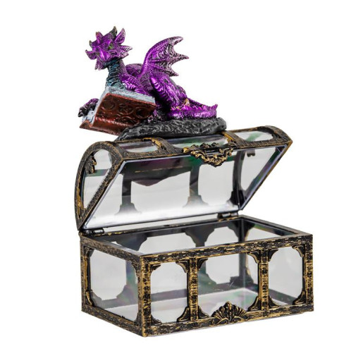 Figura de un dragon sobre un baul Morado