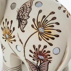 Figura elefante blanco y dorado