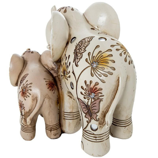 Figura elefante blanco y dorado