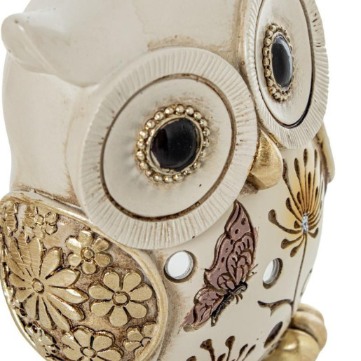 Figura buho blanco y dorado