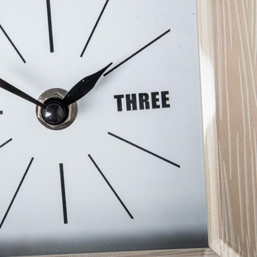 Reloj crema